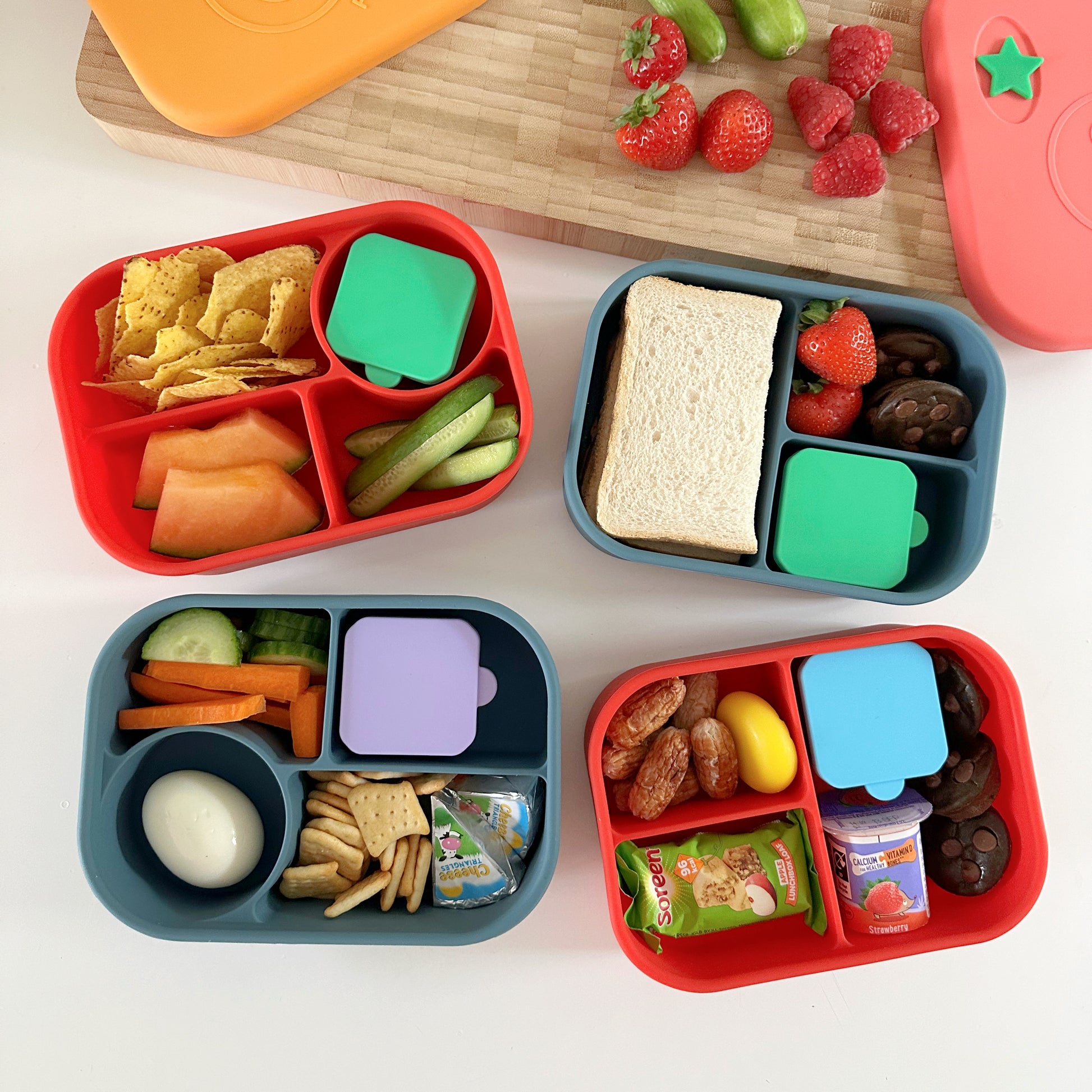 Pick Plates Pick & Dips Pots shown being used in silicone lunchboxes.