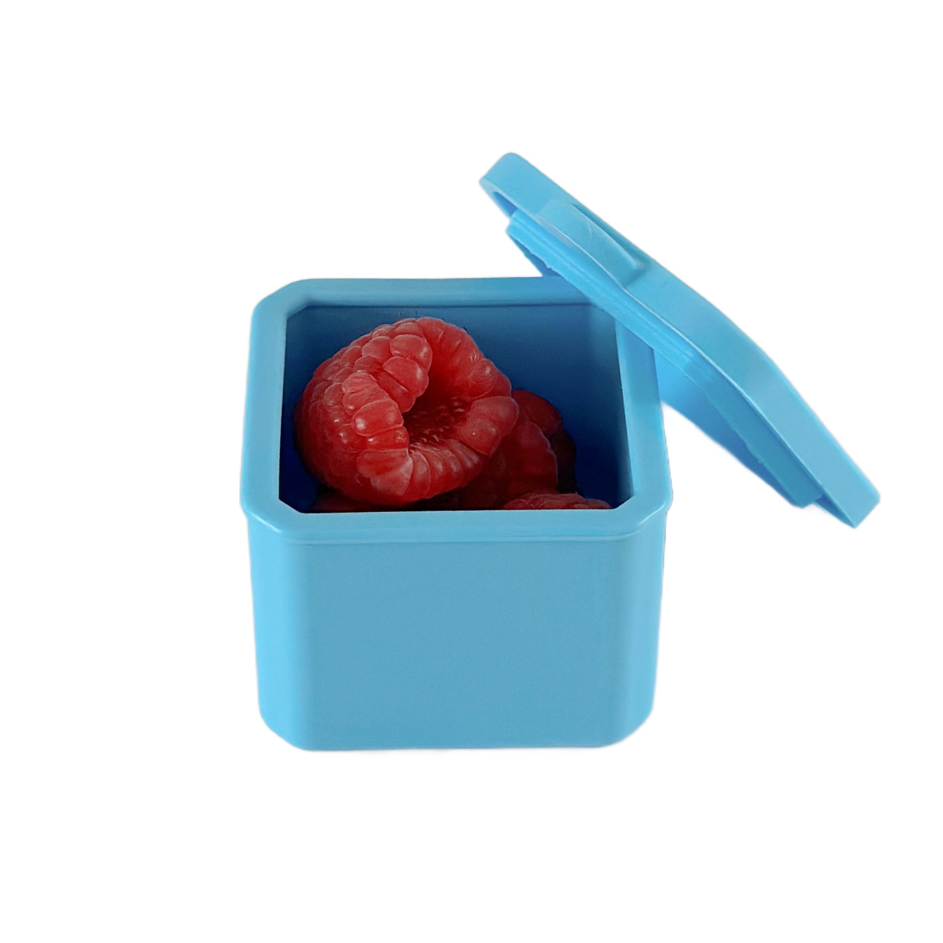 small blue silicone food pot with lid containing fresh raspberries
