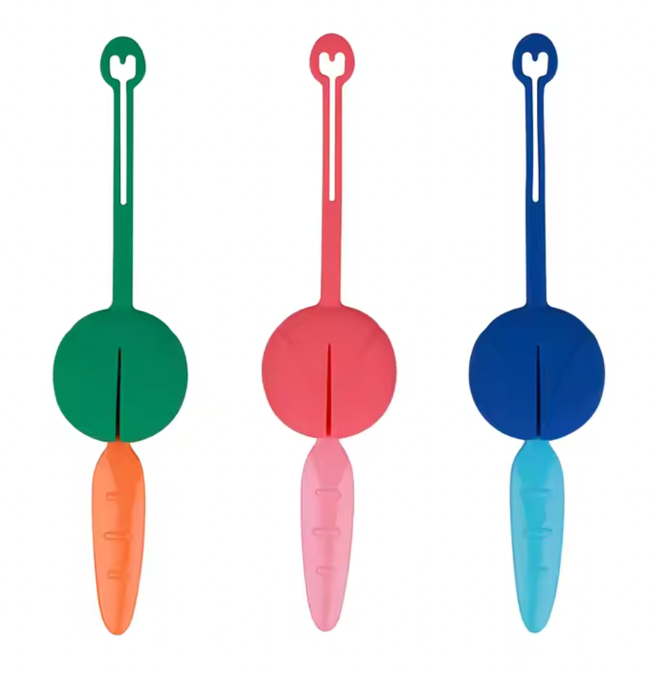 3 sets of lunchbox cutlery in 3 different colour ways. Green with Orange, Pink and Blue.