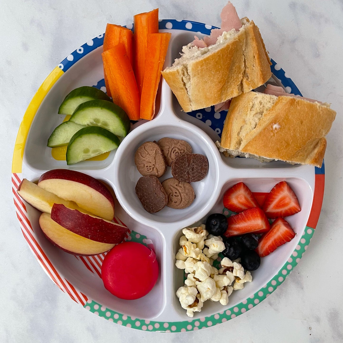 The Pick Plate Midi shown being used for a child's lunch.