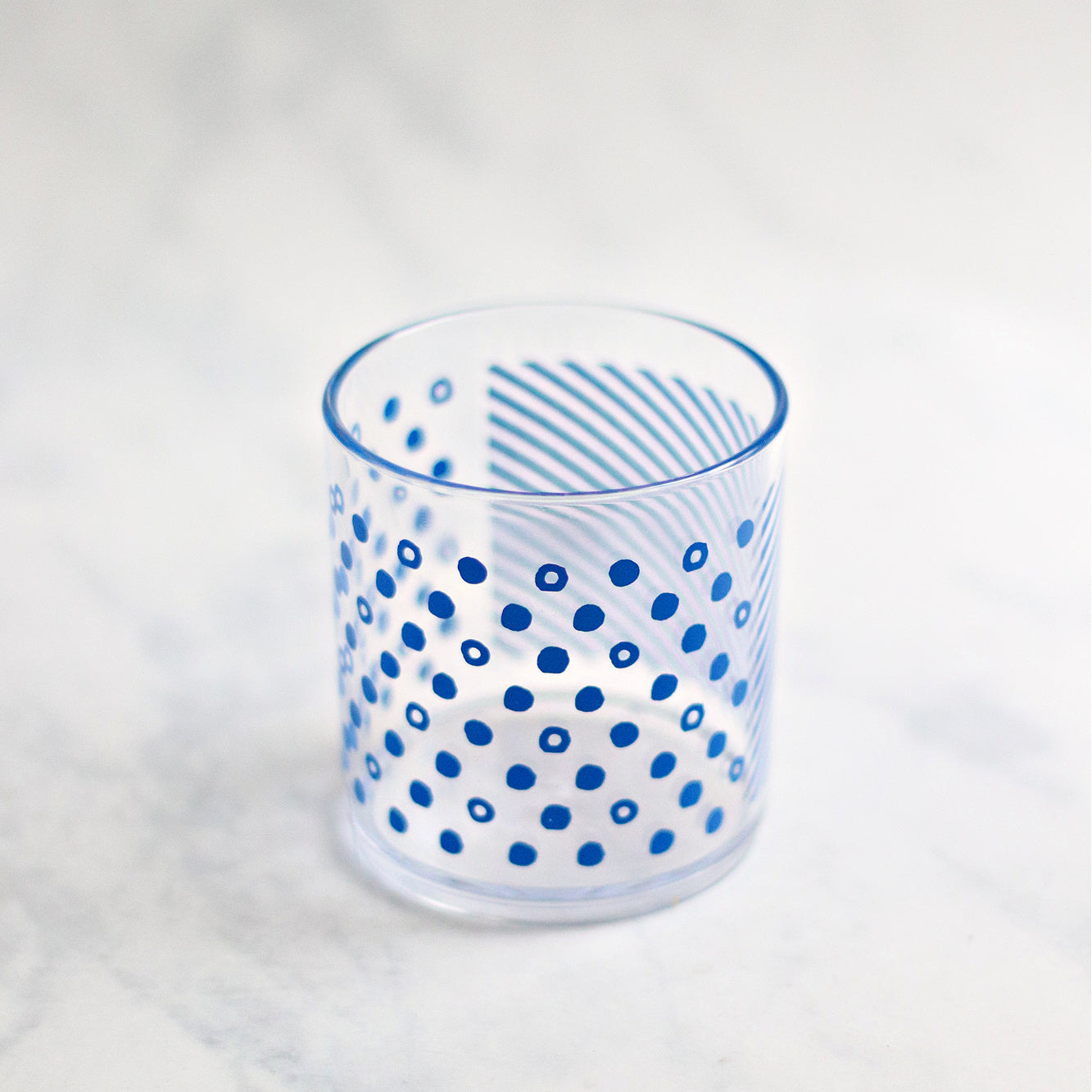 A clear PBA Free tumbler for kids with printed blue design